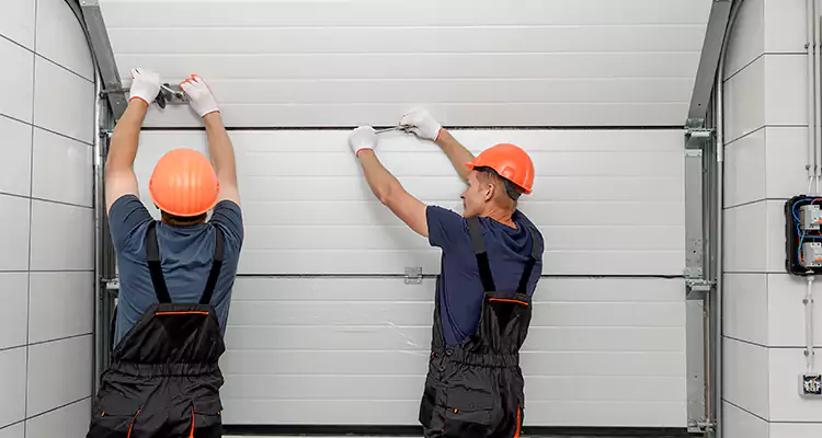 Garage Door Bottom Panel Repair in Titusville, FL